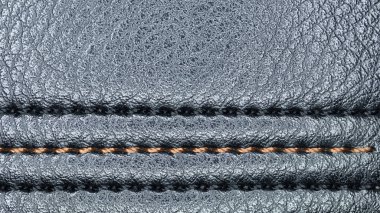 Kabartma deri dikişli makro dikiş / fotoğraf minimalizm doku arka plan