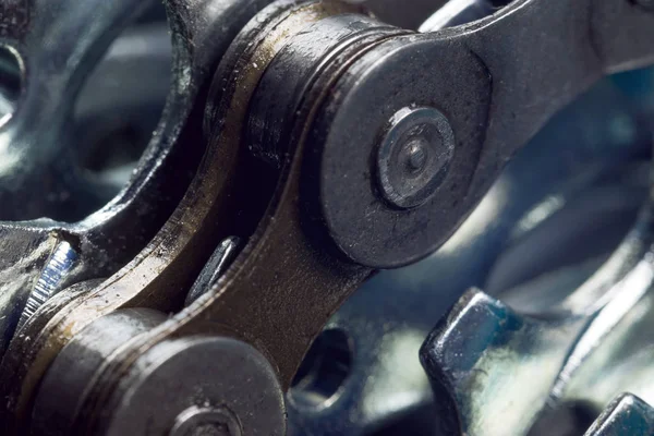 Bisiklet zinciri liderliğindeki yedek parça / fotoğraf spor malzemeleri arka plan