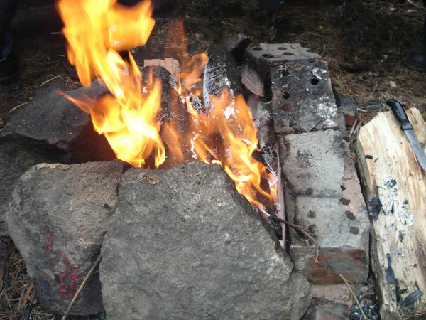Fire between stones and bricks — Stock Photo, Image