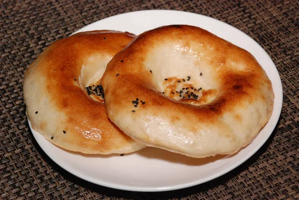 Fresh arabic bread with black sesame seeds — Stock Photo, Image