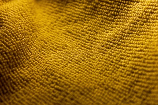 黄色のマイクロファイバーの背景 — ストック写真