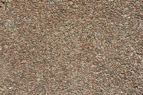 The texture of the wall of granite chips Stock Picture