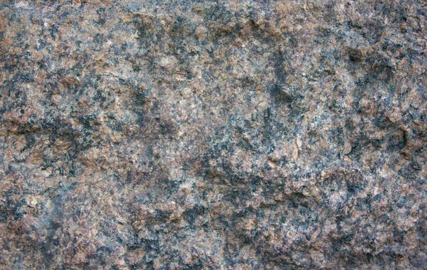 Röd granit textur i dagsljus — Stockfoto