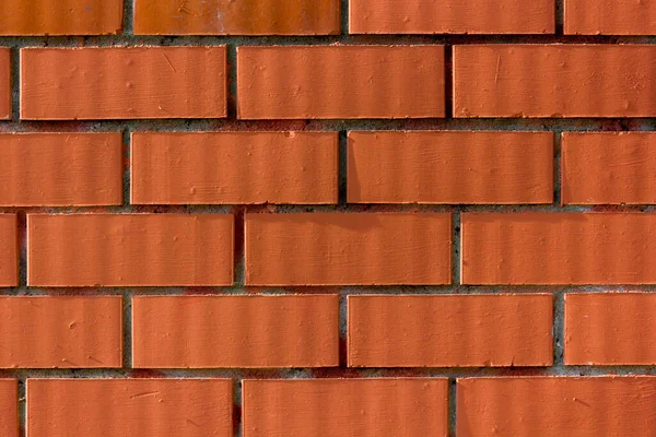 Sert Güneş Işığı Altında Kırmızı Tuğla Duvar Arkaplanı — Stok fotoğraf