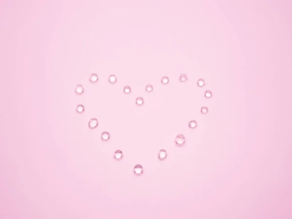 Koncepcja Walentynki Żelem Krzemionkowym Selektywny Fokus Kształcie Serca Różowym Tle — Zdjęcie stockowe