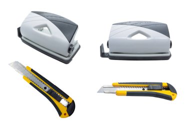 Gri Masaüstü Delik Punch ve Sarı kırtasiye bıçak beyaz arka plan üzerinde izole. Ön görüş. Yan görünüm.