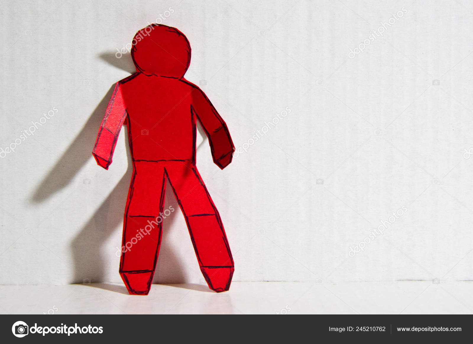 Abstract Image Lonely Man Made Paper Cutout Wall Stock Photo by