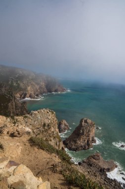 cabo de roca landscape fog and sun