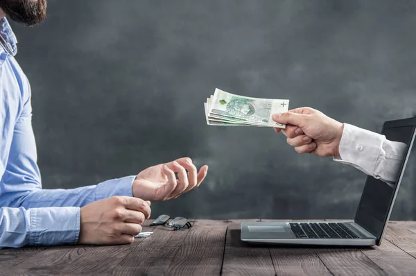 Businessman Gets Polish Cash Hand Coming Out Laptop Monitor Conception — Stock Photo, Image