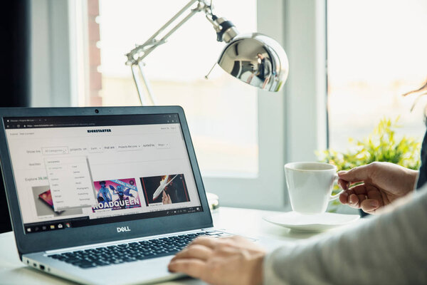WROCLAW, POLAND - NOVEMBER 29th, 2018: Modern laptop on the desk in office with Kickstarter website on the screen. Kickstarter is a global crowdfunding platform focused on creativity and merchandising.