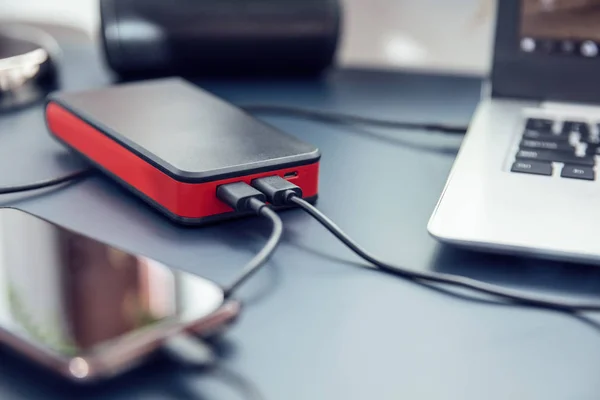 Close up to power bank USB-C ports connected to two devices. — Stock Photo, Image