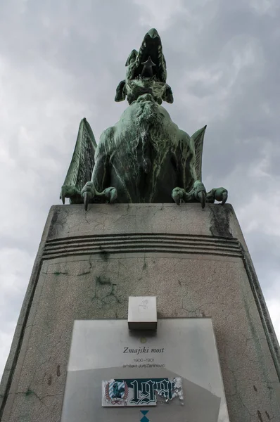 Slovenia, 24/06/2018: the Dragon statue by Jurij Zaninovi on the Dragon Bridge (Zmajski most), the most famous road bridge of Ljubljana built in the early 20th century under the Austro-Hungarian Monarchy