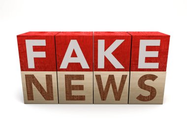 Ahşap küp blok kelime sahte haberlerle beyaz arka plan üzerinde. Kavram. Önemsiz haber sarı gazetecilik veya kasıtlı dezenformasyon oluşur propaganda türüdür veya geleneksel baskı ve yayın haber medya, online sosyal medya asılsız yaymak