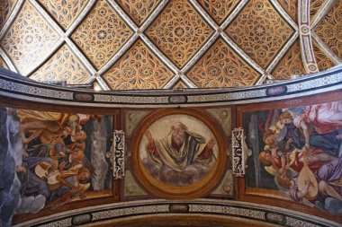 Milan, Italy, Europe, 03/28/2019: the interior of San Maurizio al Monastero Maggiore, a 1518 church known as the Sistine Chapel of Milan, details of the ceiling in the faithful's area with the frescoes by Aurelio Luini clipart