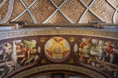 Milan, Italy, Europe, 03/28/2019: the interior of San Maurizio al Monastero Maggiore, a 1518 church known as the Sistine Chapel of Milan, details of the ceiling in the faithful's area with the frescoes by Aurelio Luini clipart