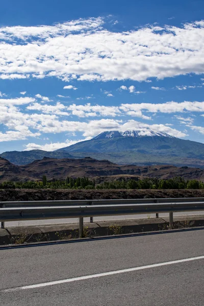 Turkey, Middle East: the road from Igdir to Dogubayazit with view of Mount Ararat, Agri Dagi, the highest mountain in the extreme east of Turkey, the resting place of Noah\'s Ark for Christianity, snow-capped and dormant compound volcano