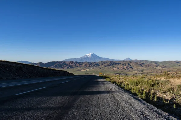 Turkey, Middle East: the road from Dogubayazit to Lake Van with view of Mount Ararat, Agri Dagi, the highest mountain in the extreme east of Turkey, the resting place of Noah's Ark for Christianity, a snow-capped and dormant volcano