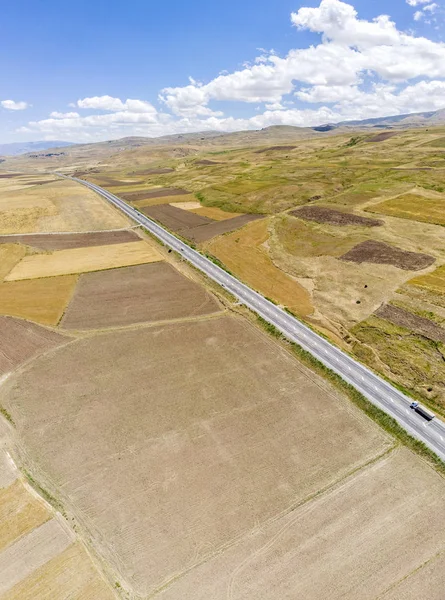 Aerial view of a road and fields along the lake Van, the largest lake in Turkey, in the provinces of Van and Bitlis.