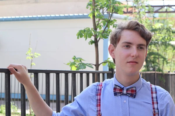 Young Man Holiday Smiling Posing Camera Has Bow Tie — Stock Photo, Image