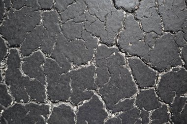 Eski yol arka plan - gri yüzeyi asfalt doku yakın kadar Miami şehir sokak kırık. siyah kırık asfalt. taş arka plan