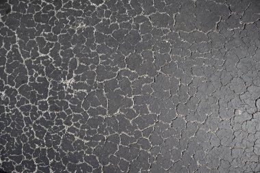 Eski yol arka plan - gri yüzeyi asfalt doku yakın kadar Miami şehir sokak kırık. siyah kırık asfalt. taş arka plan