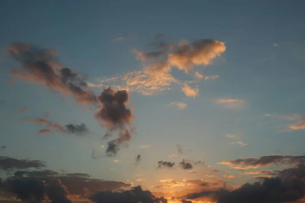 beautiful sunset orange color and clouds. view from the piste.