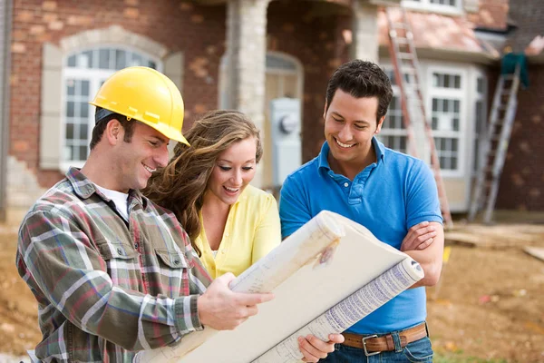 Construction: Homeowners Excited to Look at Plans — Stock Photo, Image