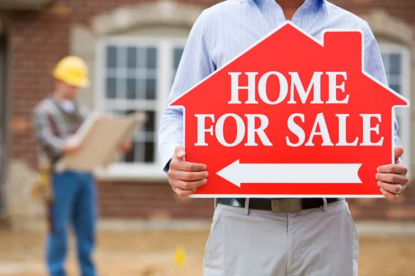 Construction: Agent at Open House Holds Sign — Stock Photo, Image