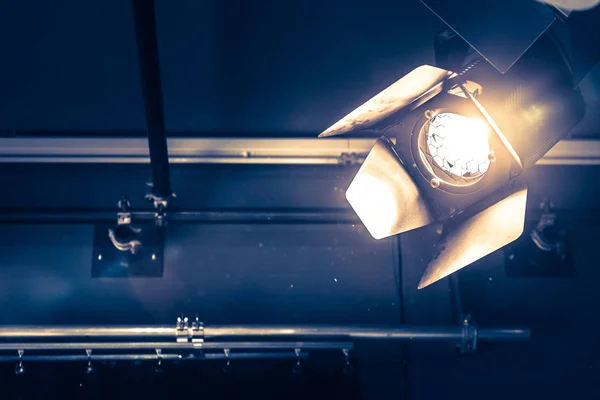Professional Orange Studio Spotlight Hanging Ceiling Lighted Dust Particles Lens — Stock Photo, Image