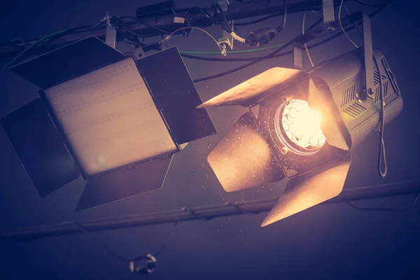 Professional Orange Studio Spotlight Hanging Ceiling Lighted Dust Particles Lens — Stock Photo, Image