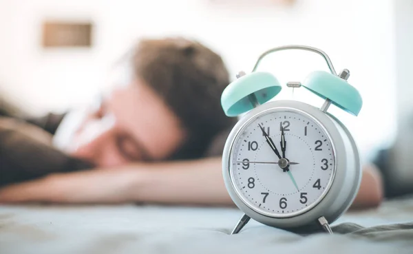 White Alarm Clock Morning Young Man Sleeps Background — Stock Photo, Image