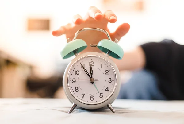 Man Pushing Alarm Clock Sunshine Morning Blurry Background — Stock Photo, Image