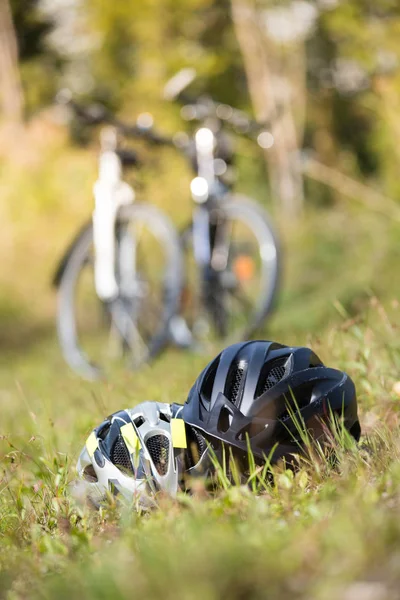 Bike helmets in the grass, bike tour