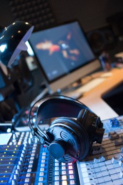 Professional sound recording studio: Headphones on a mixer desk, Radio clipart