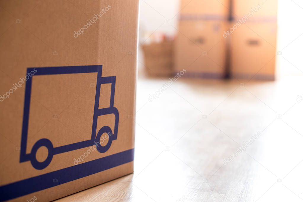 Move. Cardboard, boxes for moving into a new, clean and bright h