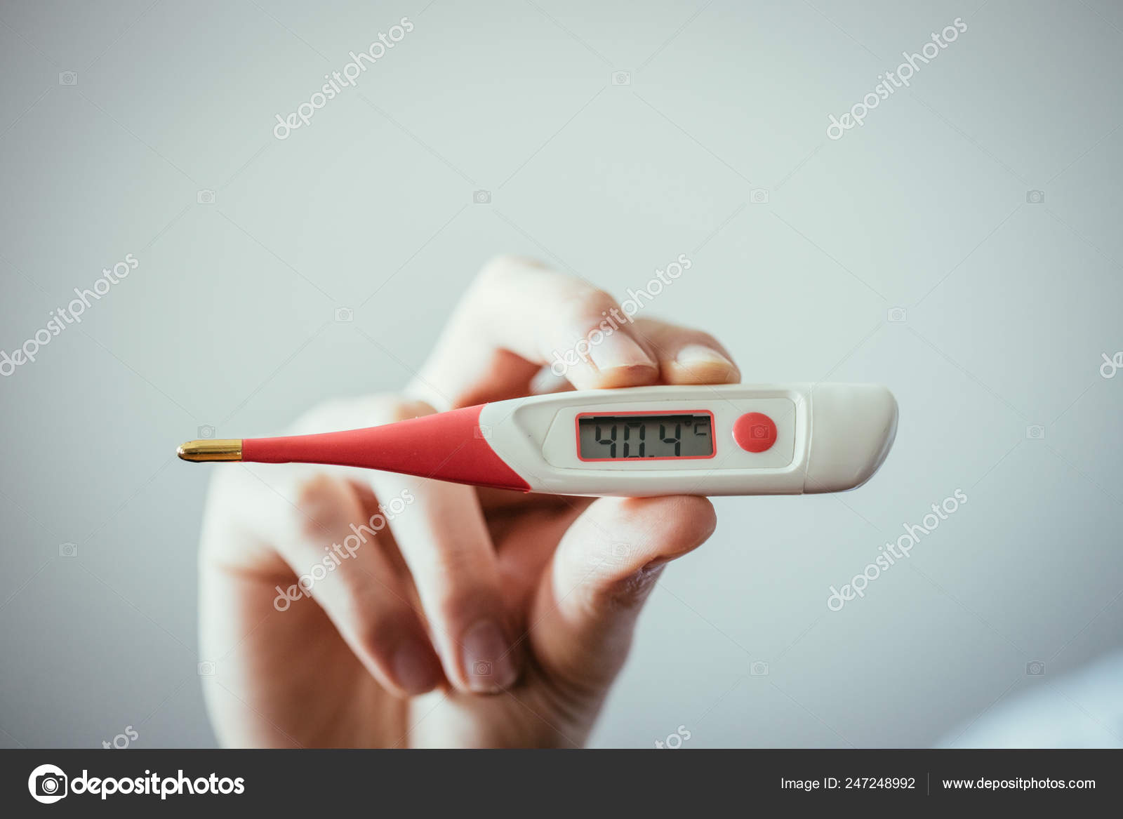 Man Holding Fever Thermometer His Hand.
