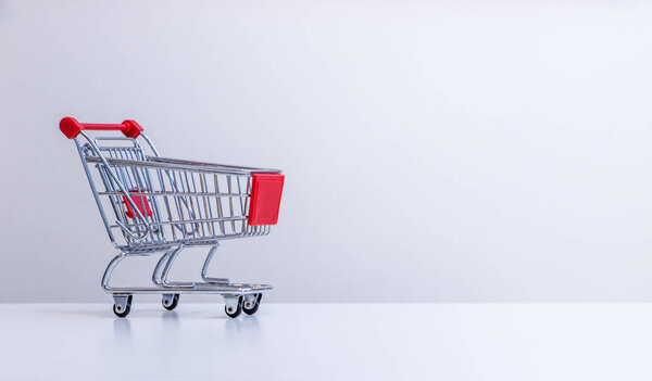 Sale: Shopping cart with copy space, grey 