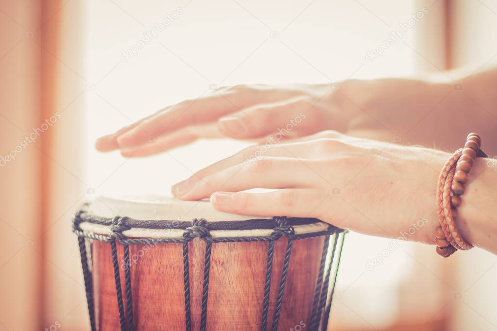 Playing the drum. Cut out of male���s hands which are playing in