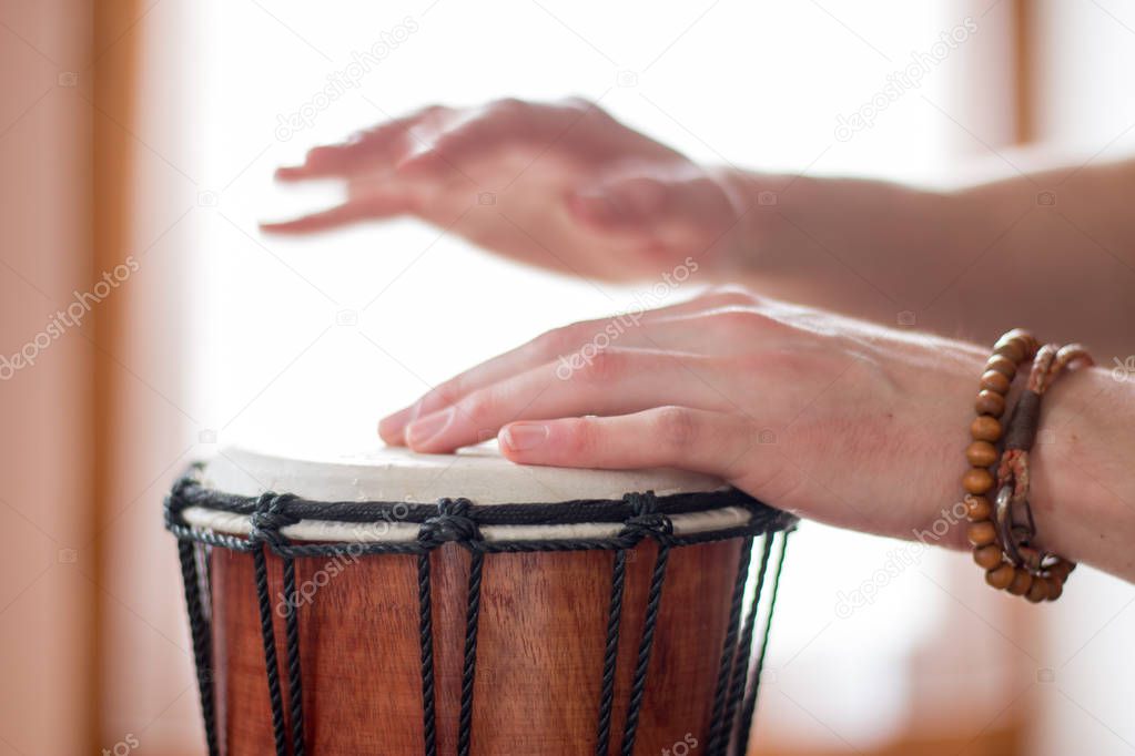 Playing the drum. Cut out of male���s hands which are playing in