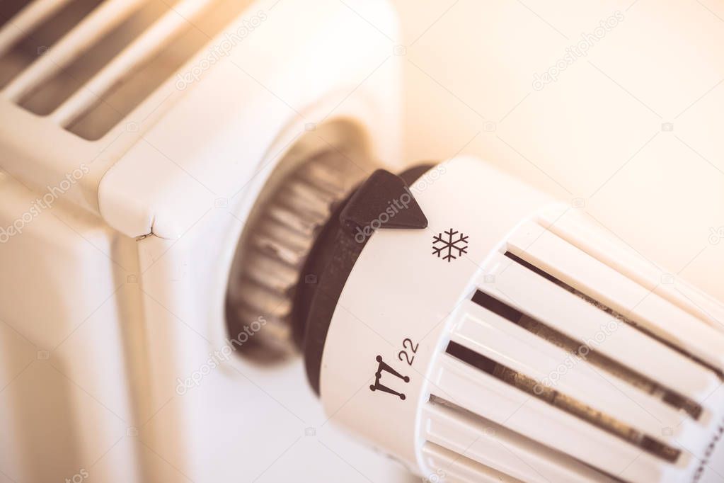 Heat regulator on a heater, close up picture. Heating Costs. 