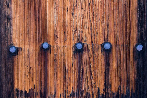 Rustikální dřevěná textura: closeup starých dřevěných hobkáků — Stock fotografie