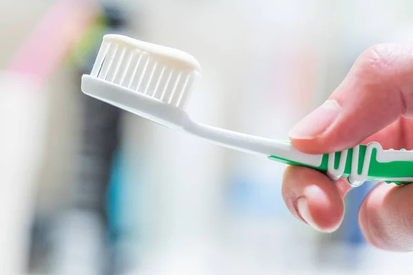 Brushing the teeth: Toothbrush in the bathroom