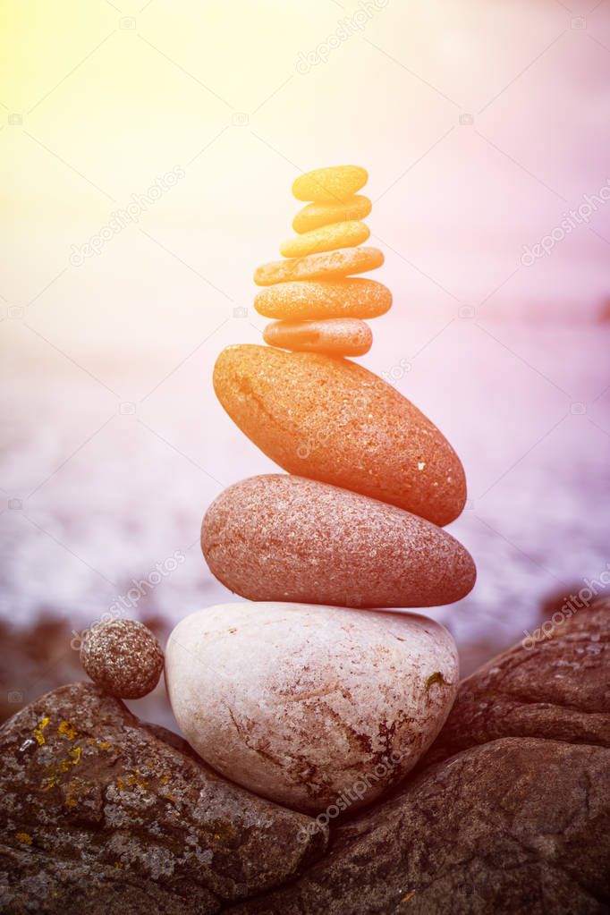 Balance, relaxation and wellness: Stone cairn outside, ocean in 