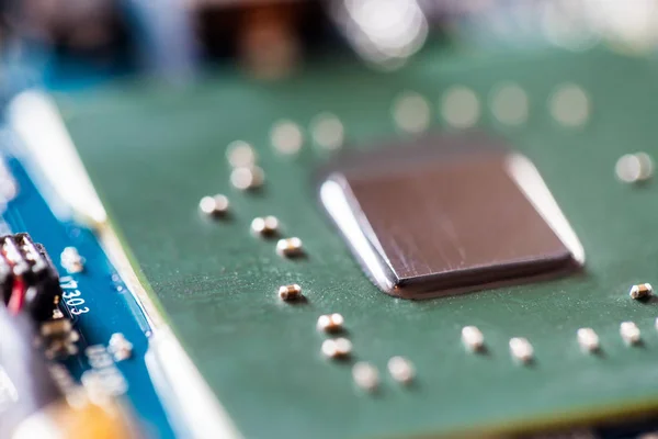 Concept of computer Technology: Close up of a computer chip on a — Stock Photo, Image