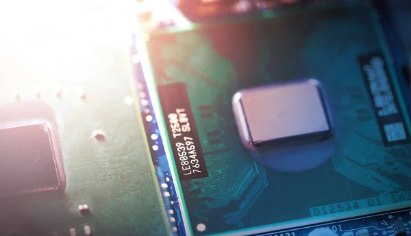 Concept of computer Technology: Close up of a computer chip on a — Stock Photo, Image