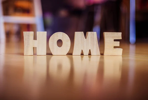 New Home: HOME Letters on the floor — Stock Photo, Image