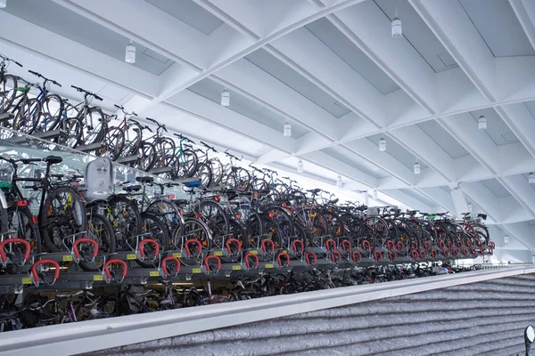 Bike rack on a train station: Stacked bikes