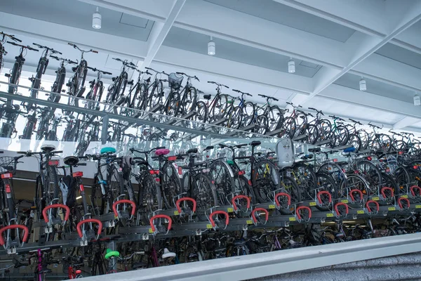 Bike rack on a train station: Stacked bikes