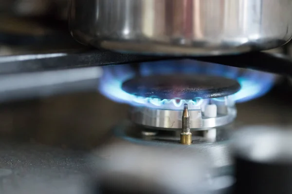 Cooking with gas, water pot in kitchen — Stock Photo, Image