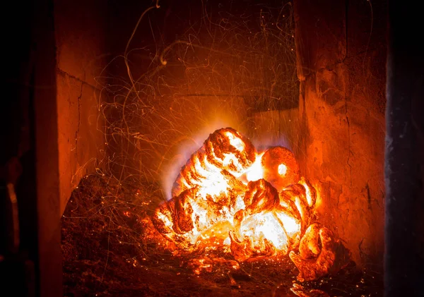 Blaze fire flame in stove, orange and black — Stock Photo, Image